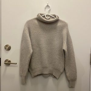 Size small women’s Wilfred merino wool sweater.